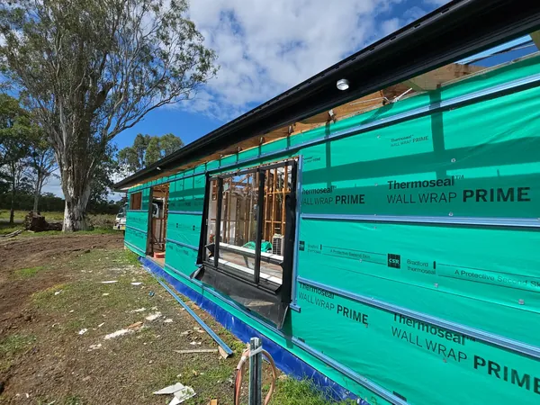 Close-up of new metal fascia colour matched to the gutter and roof