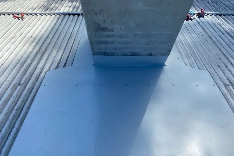 Roof repair work on a Northern Rivers home, checking the flashings and ridge